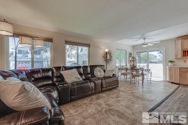 7575 Lighthouse Lane Reno, NV 89511 - Photo 13 of 40 a living room with furniture and a large window