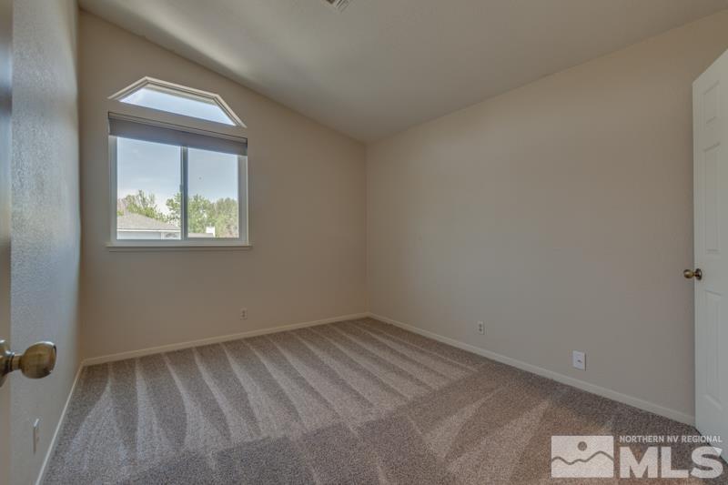 7575 Lighthouse Lane Reno, NV 89511 - Photo 28 of 40 an empty room with windows