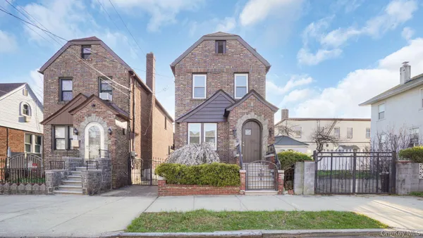 a living room with furniture fireplace and flat screen tv