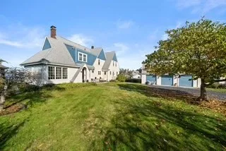 a house view with garden space