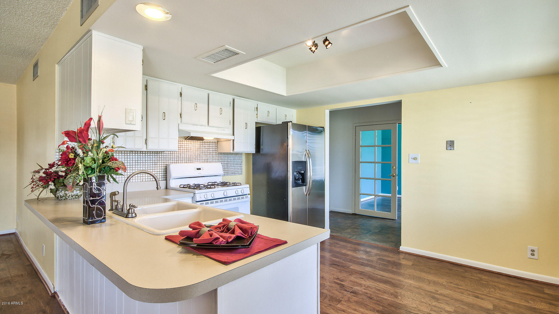 2215 West Bloomfield Road Phoenix, AZ 85029 - Photo 8 of 27 Kitchen opens to great room