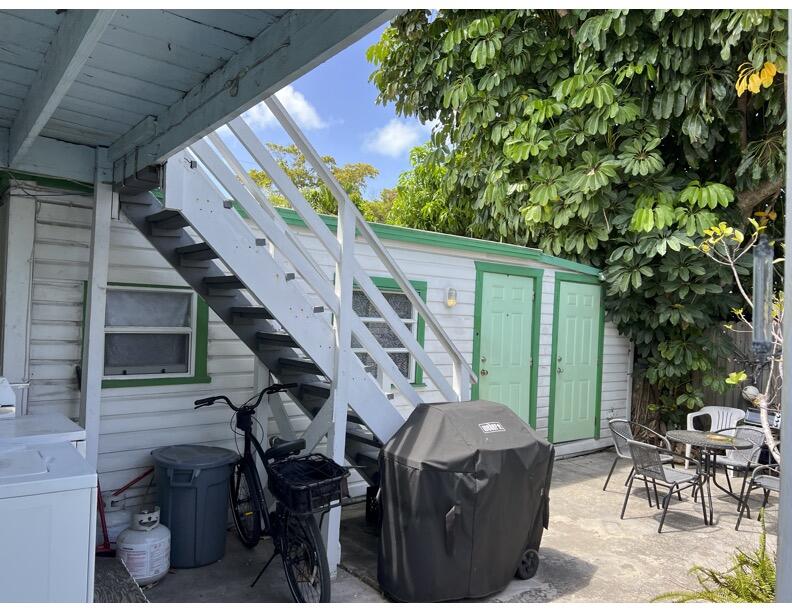 720-726 Emma Street Key West, FL 33040 - Photo 6 of 10 a view of outdoor seating and deck in the backyard