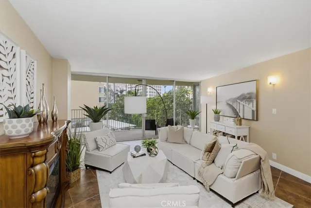a living room with furniture fireplace and a fireplace