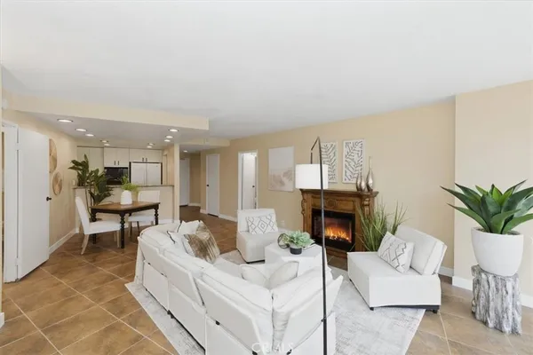 a bedroom with a bed and a lamp