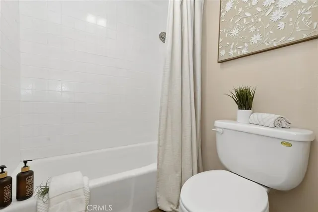 a view of balcony with furniture