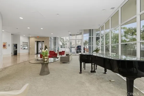 an aerial view of a house with outdoor space and parking