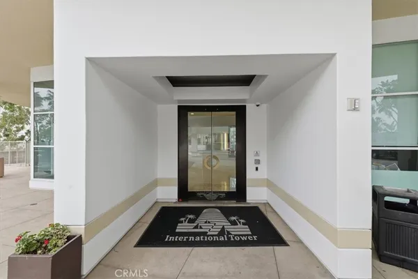 a view of kitchen with a table and a potted plant