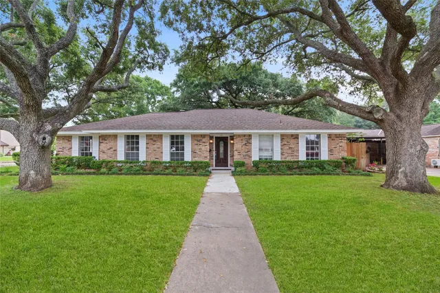 front view of a house and a yard