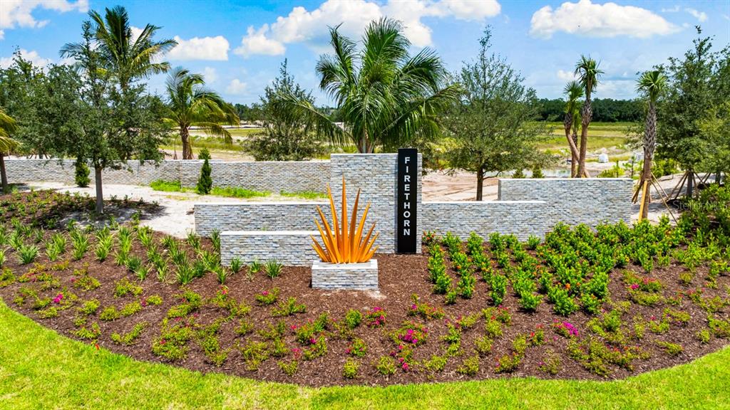 13815 Sawmill Street Parrish, FL 34219 - Photo 20 of 25 a view of a yard with flower plants