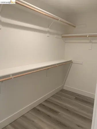 a view of an empty walk in closet
