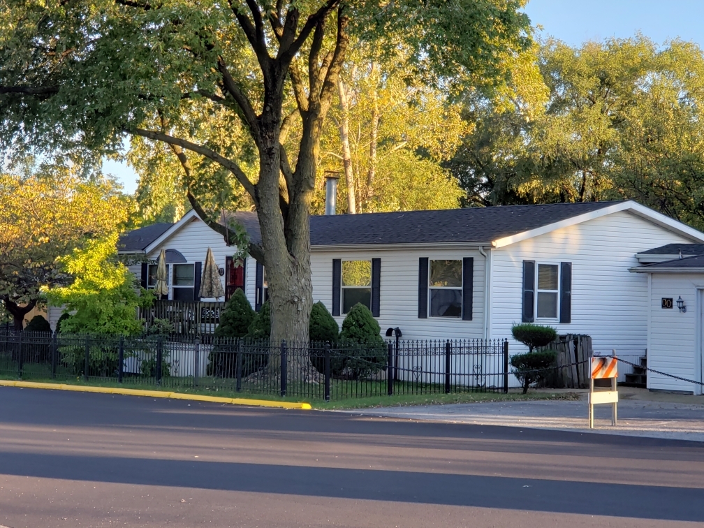 7500 Elmhurst Road Des Plaines, IL 60018 - Photo 2 of 14 a view of a house with a patio