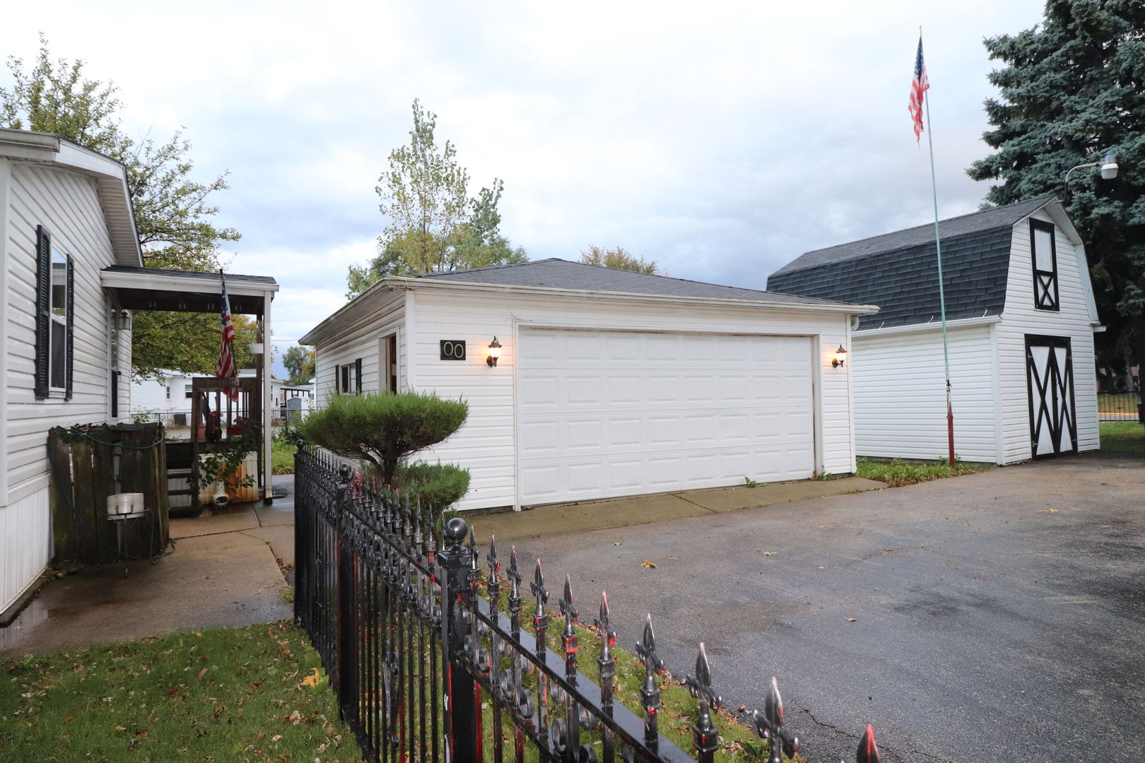 7500 Elmhurst Road Des Plaines, IL 60018 - Photo 3 of 14 a view of a house with wooden fence