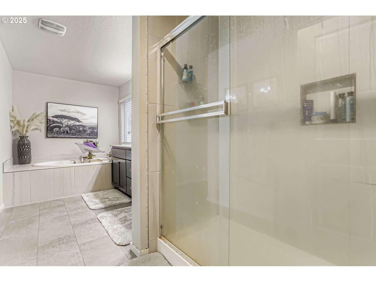 15295 Southeast Flavel Street Portland, OR 97236 - Photo 11 of 26 a bathroom with a tub shower vanity and a sink