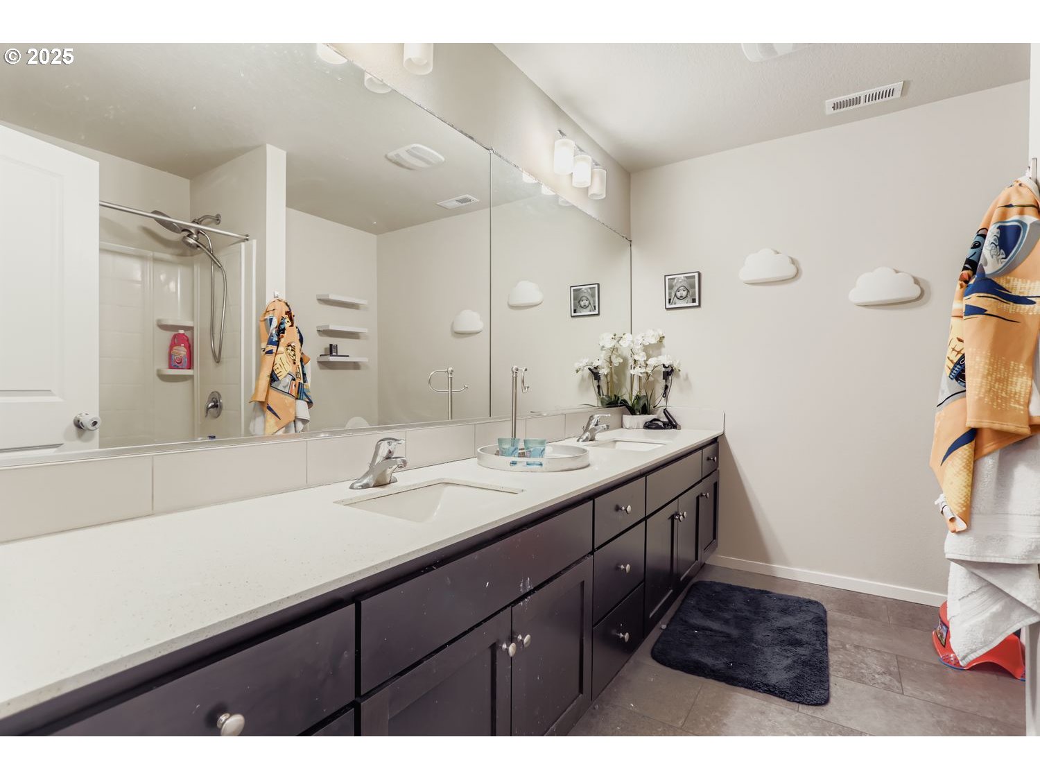 15295 Southeast Flavel Street Portland, OR 97236 - Photo 15 of 26 a bathroom with a sink and a mirror