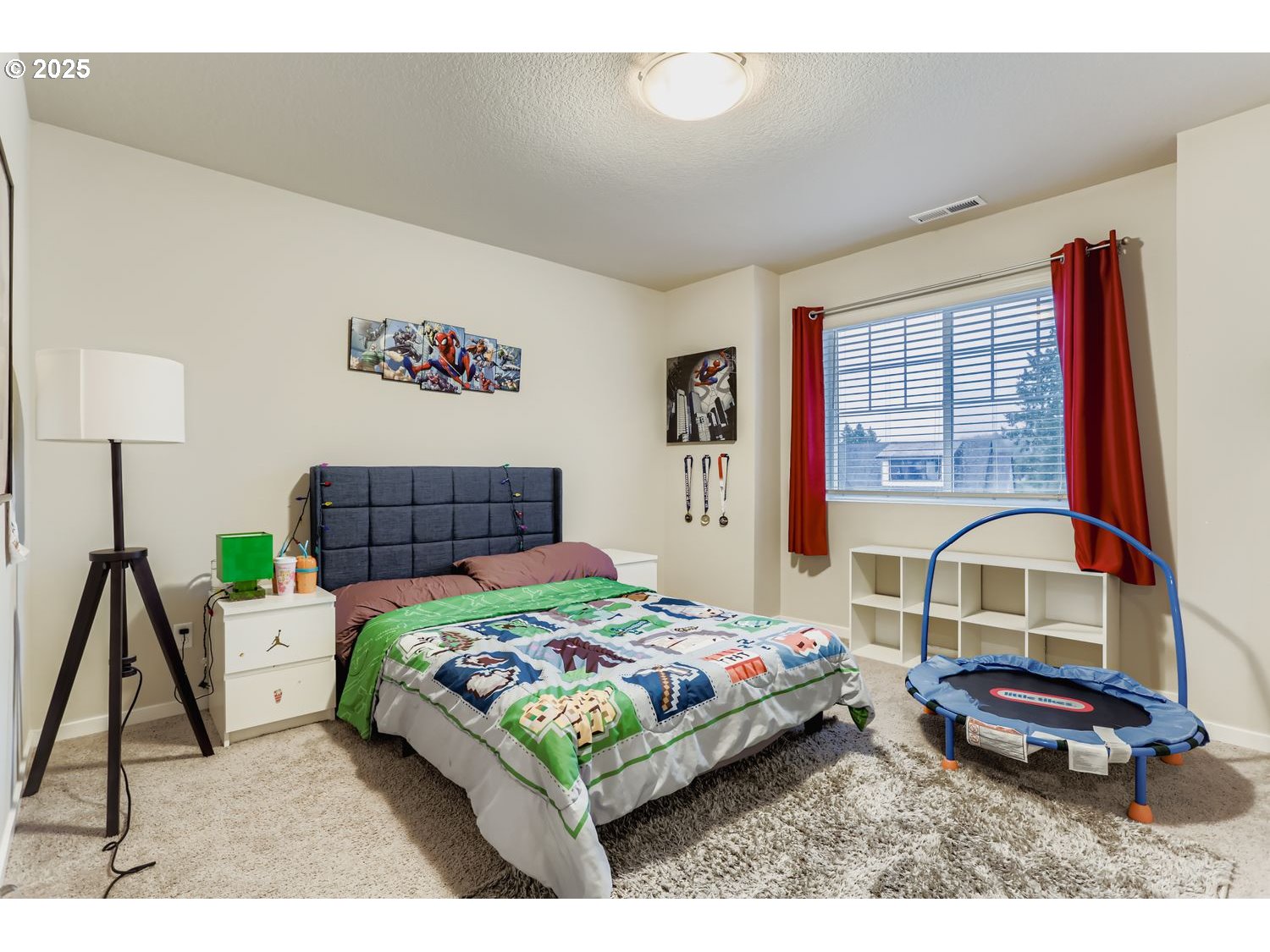 15295 Southeast Flavel Street Portland, OR 97236 - Photo 16 of 26 a bedroom with a bed a dresser and a window
