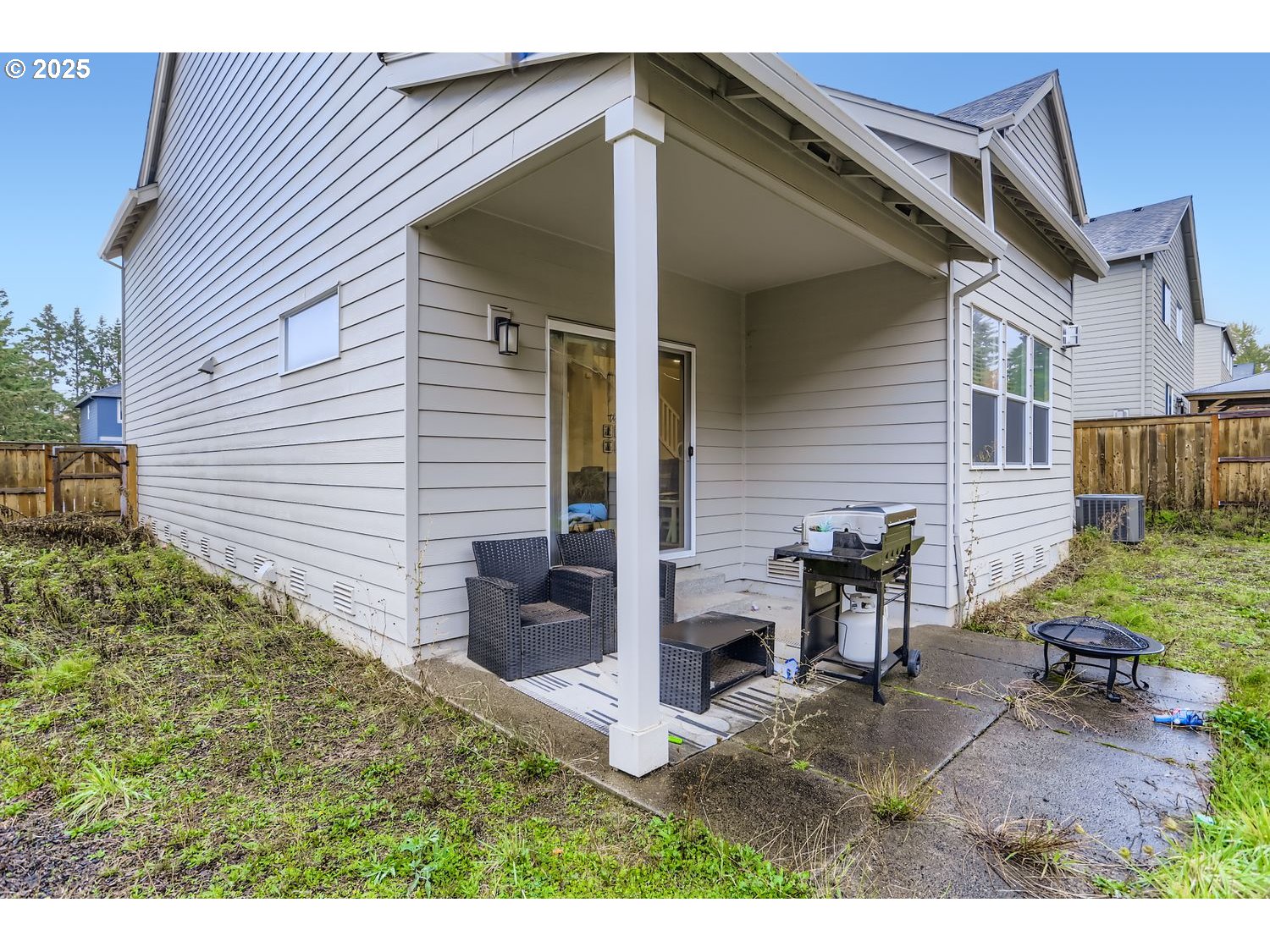 15295 Southeast Flavel Street Portland, OR 97236 - Photo 21 of 26 a view of a house with backyard and sitting area