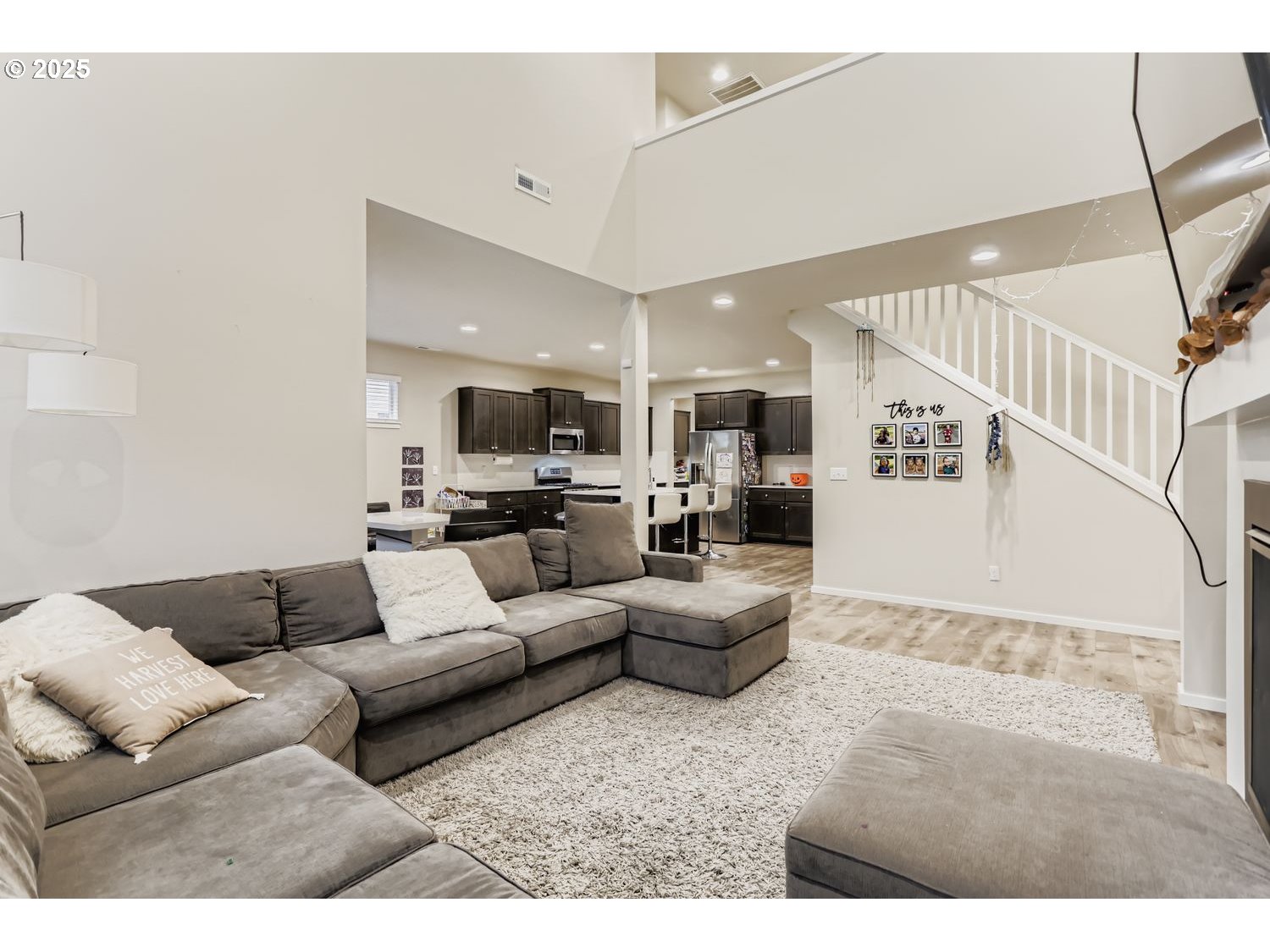 15295 Southeast Flavel Street Portland, OR 97236 - Photo 7 of 26 a living room with furniture and kitchen view