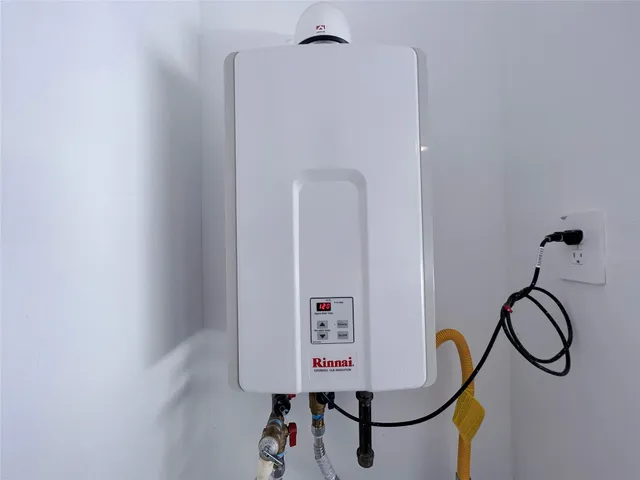 a picture of a bathroom with a shower and mirror