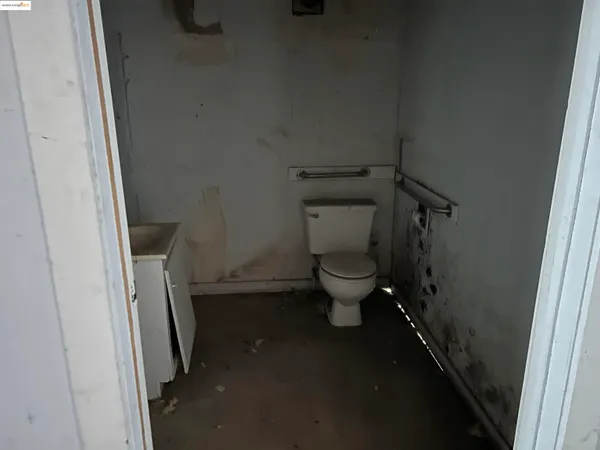 a small bathroom with a toilet and a sink