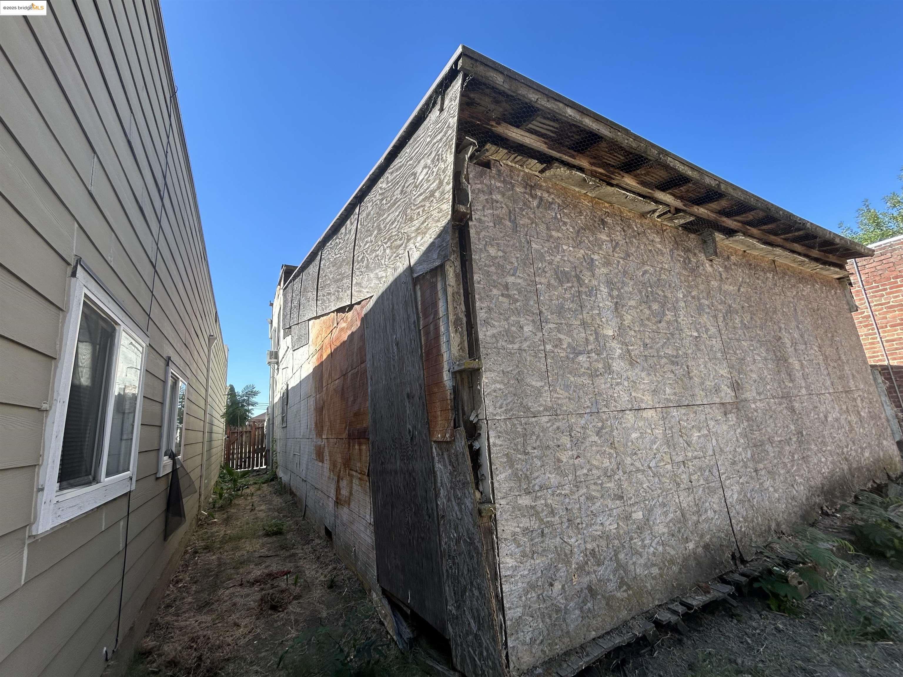 39 Main Street Isleton, CA 95641 - Photo 26 of 29 a view of a house with a wooden wall