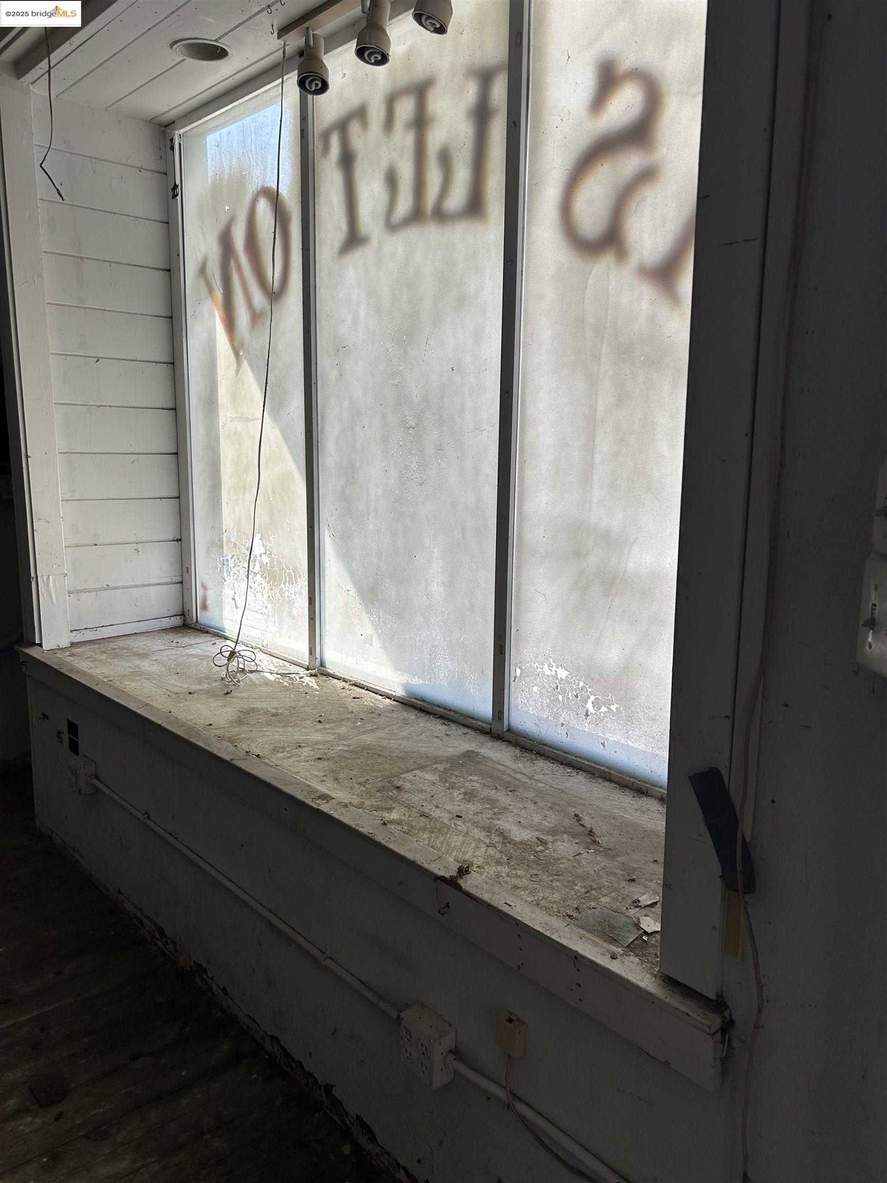 39 Main Street Isleton, CA 95641 - Photo 10 of 29 a bathroom with a granite countertop sink and a mirror