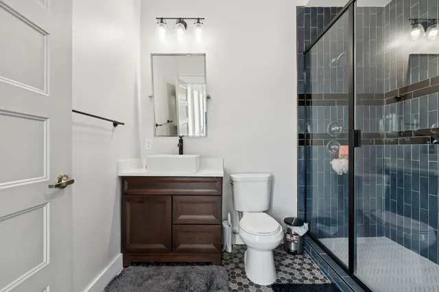 an aerial view of a house with a garden