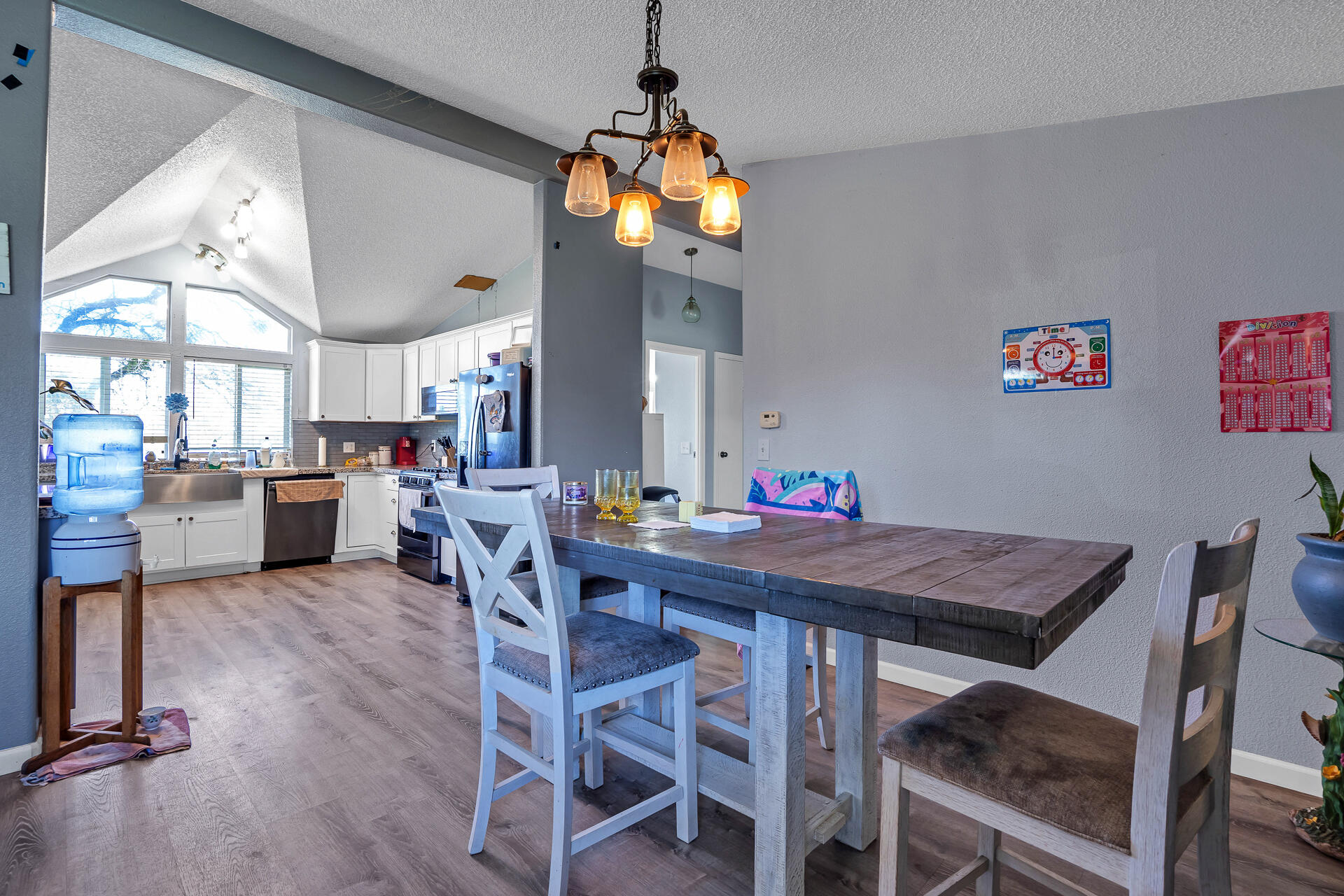 27127 Swede Creek Road Oak Run, CA 96069 - Photo 13 of 33 a view of a dining room with furniture and a chandelier
