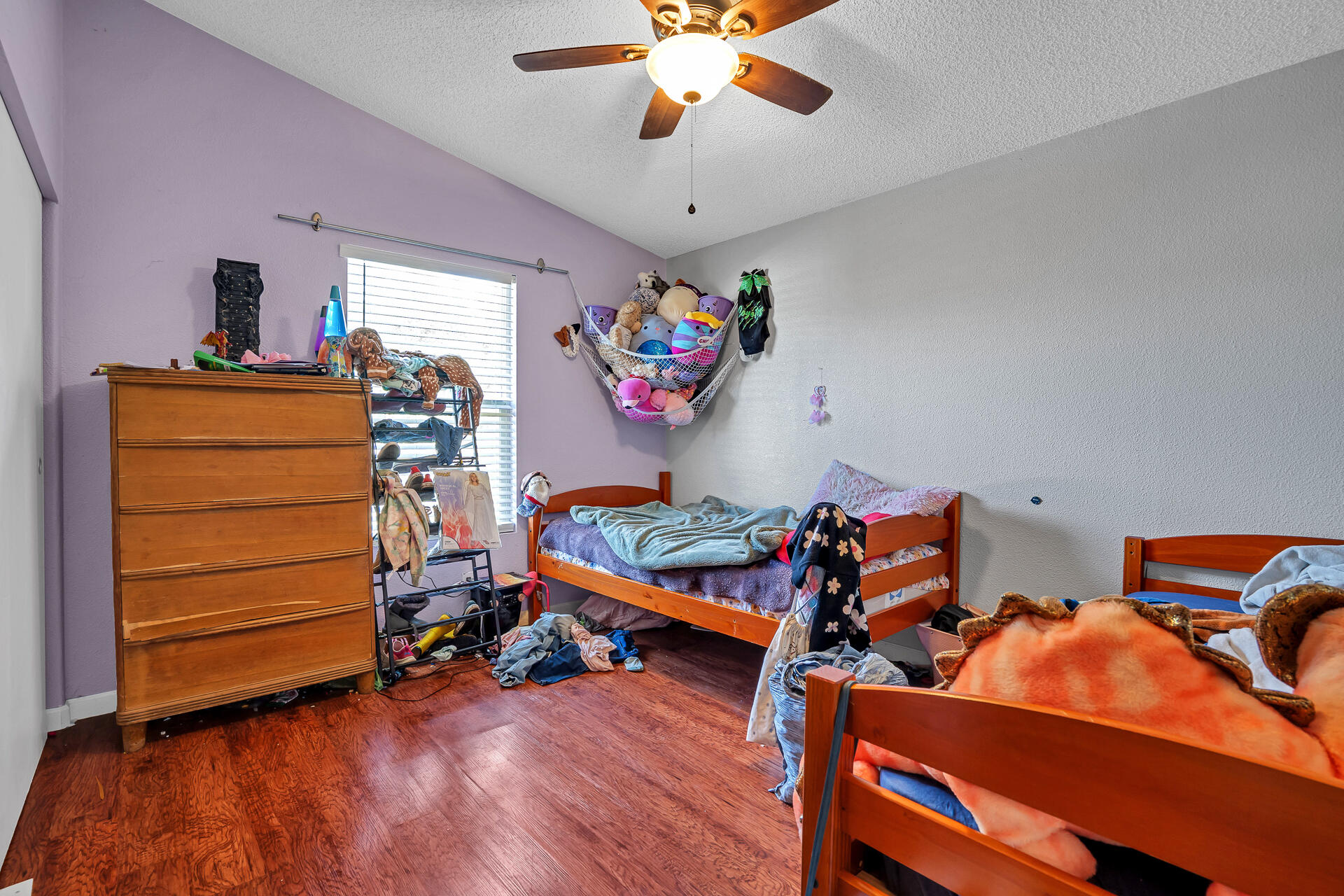 27127 Swede Creek Road Oak Run, CA 96069 - Photo 30 of 33 a bedroom with bed and a chandelier