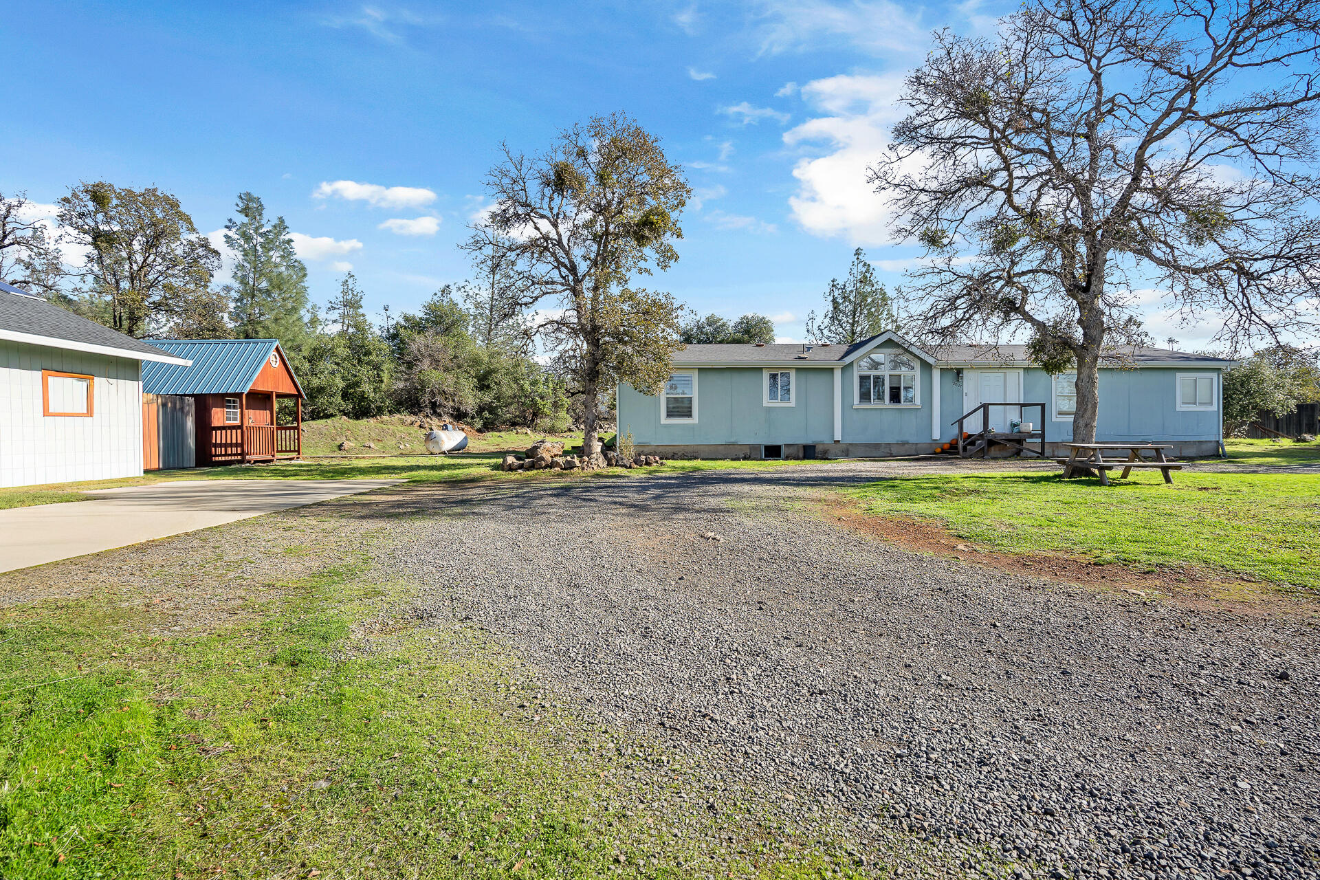 27127 Swede Creek Road Oak Run, CA 96069 - Photo 3 of 33 a view of residential houses with yard and trees