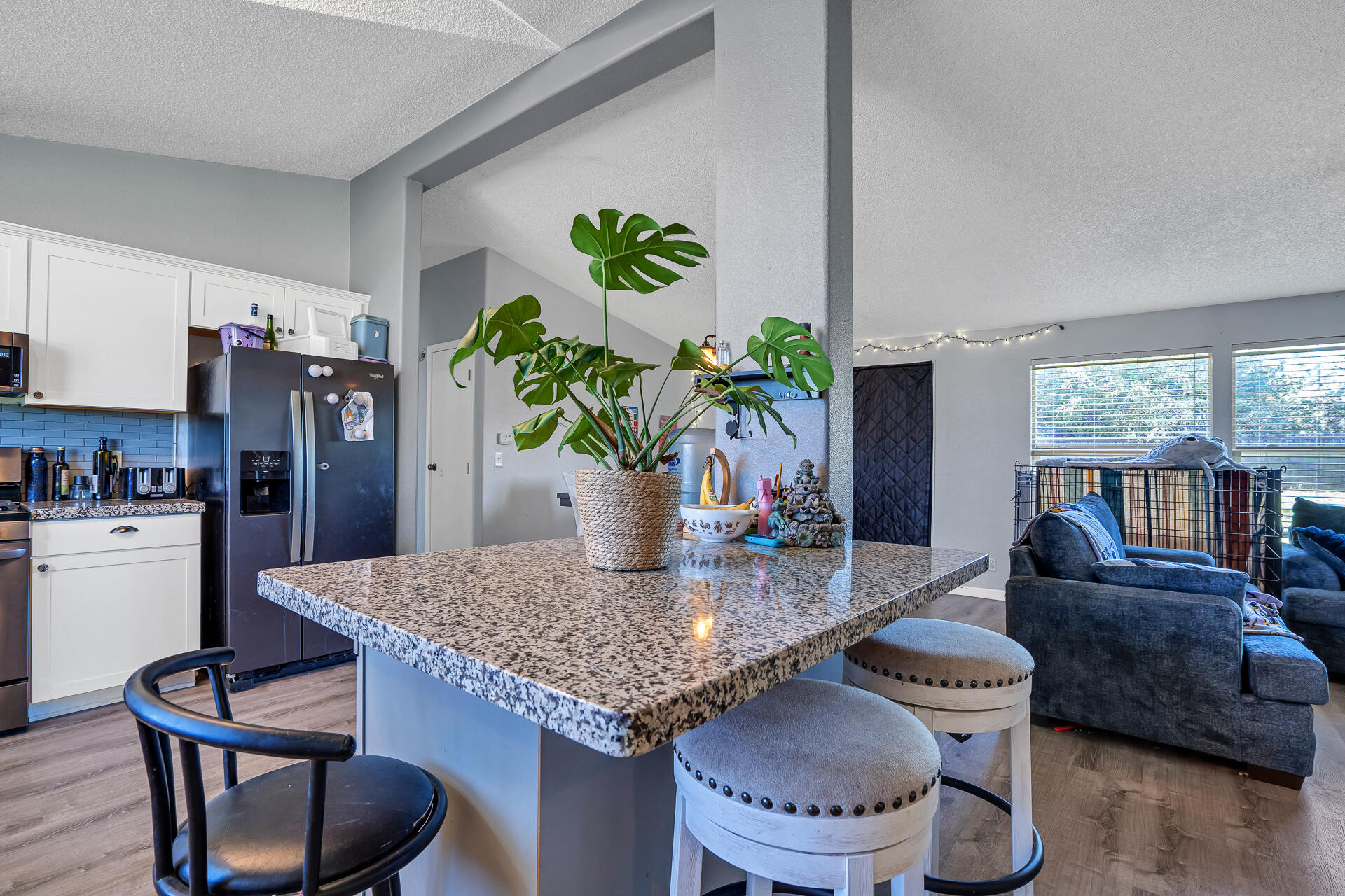 27127 Swede Creek Road Oak Run, CA 96069 - Photo 9 of 33 a living room with stainless steel appliances furniture a rug and a kitchen