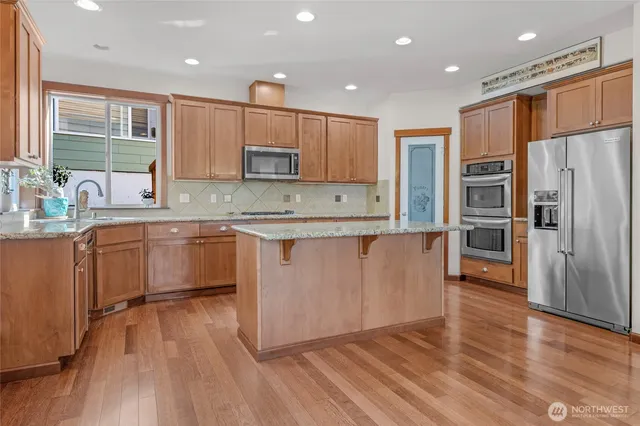 a utility room with a sink a washer and dryer