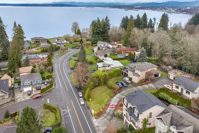 an aerial view of a house with outdoor space