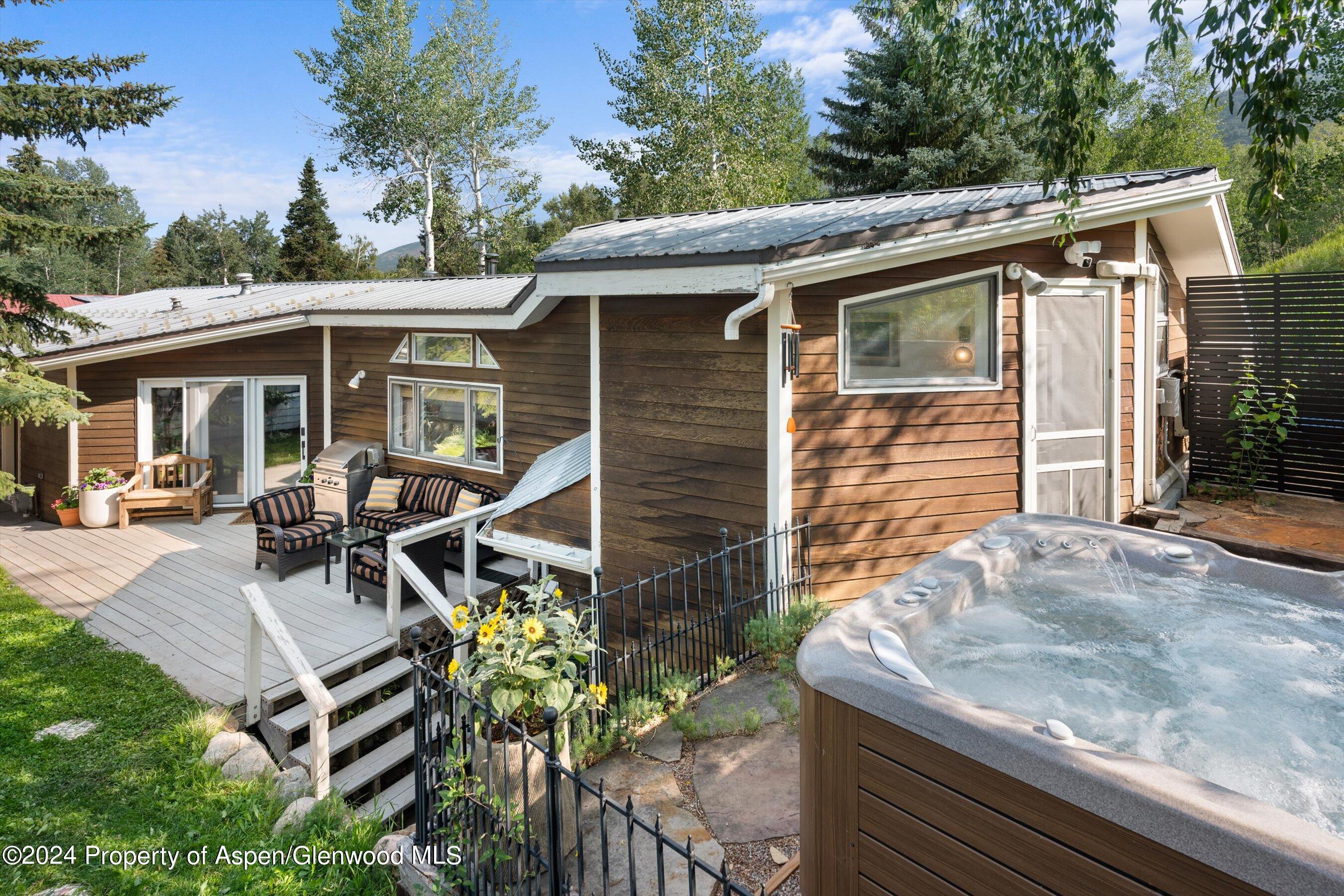 140 Maple Lane Aspen, CO 81611 - Photo 1 of 37 a house view with a seating space