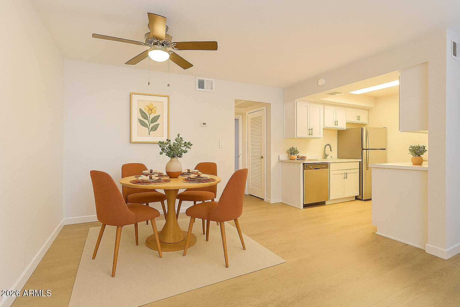 2247 East Cactus Road, Unit 2 Phoenix, AZ 85022 - Photo 3 of 15 3 Staged Dining Area