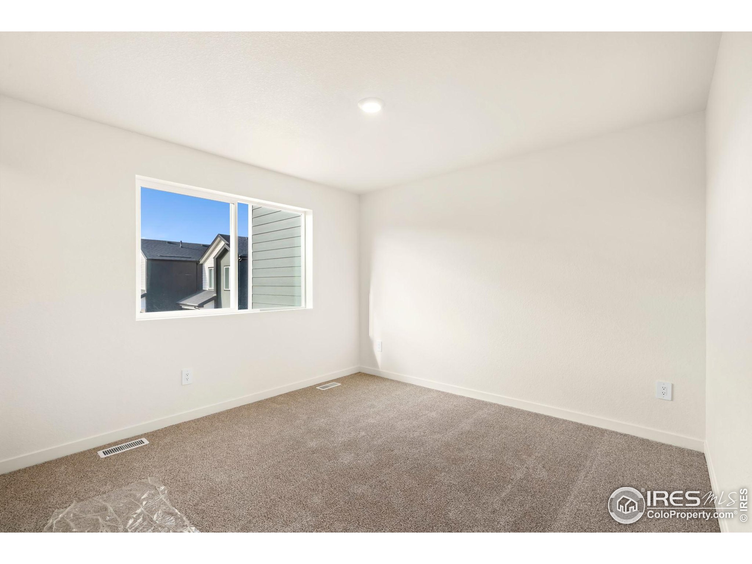 3904 Net Street Evans, CO 80620 - Photo 11 of 14 a view of an empty room