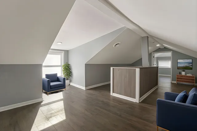 a living room with furniture and a couch