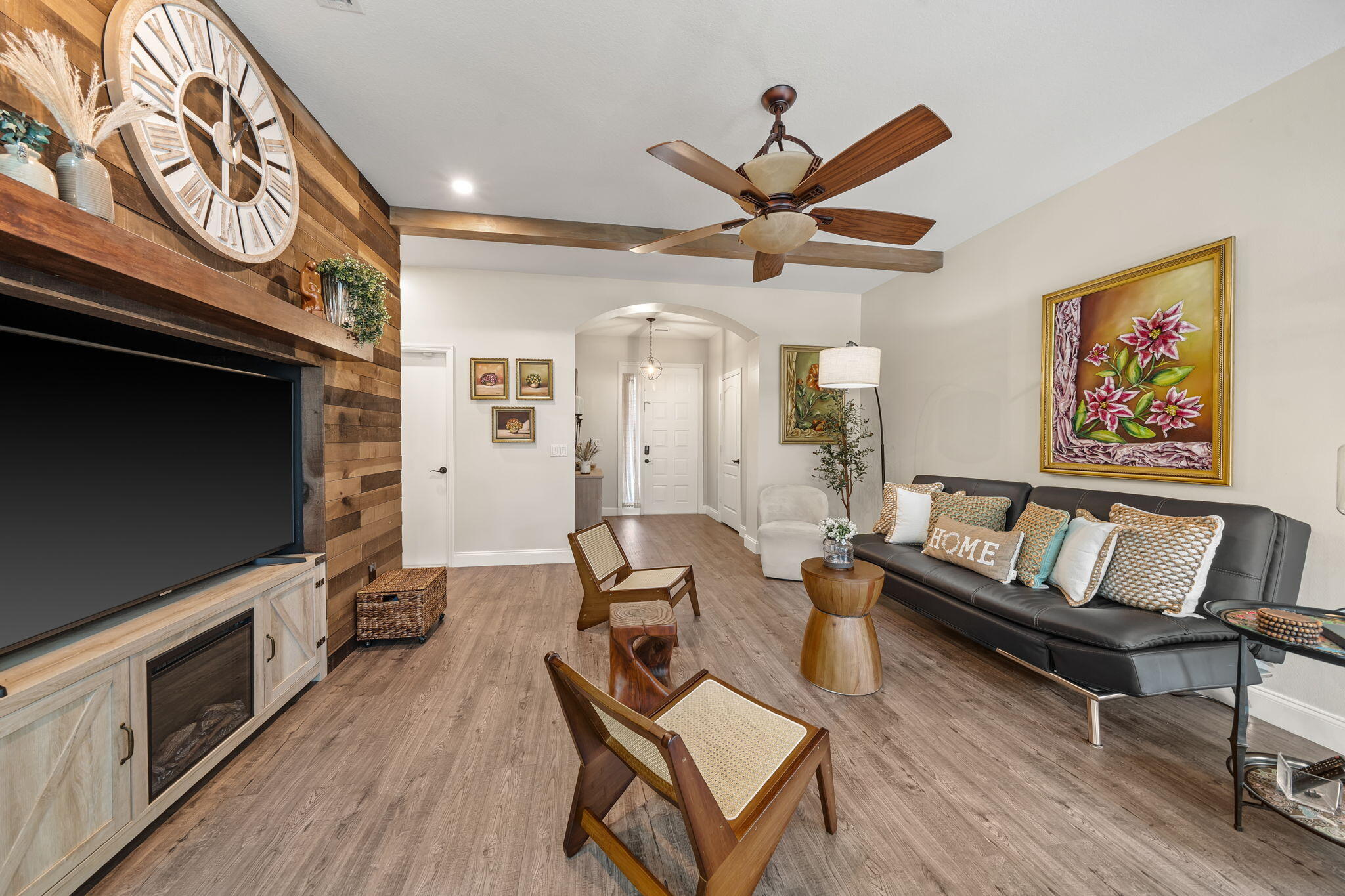 123 Wakulla Springs Way Royal Palm Beach, FL 33411 - Photo 17 of 27 a living room with furniture and a flat screen tv