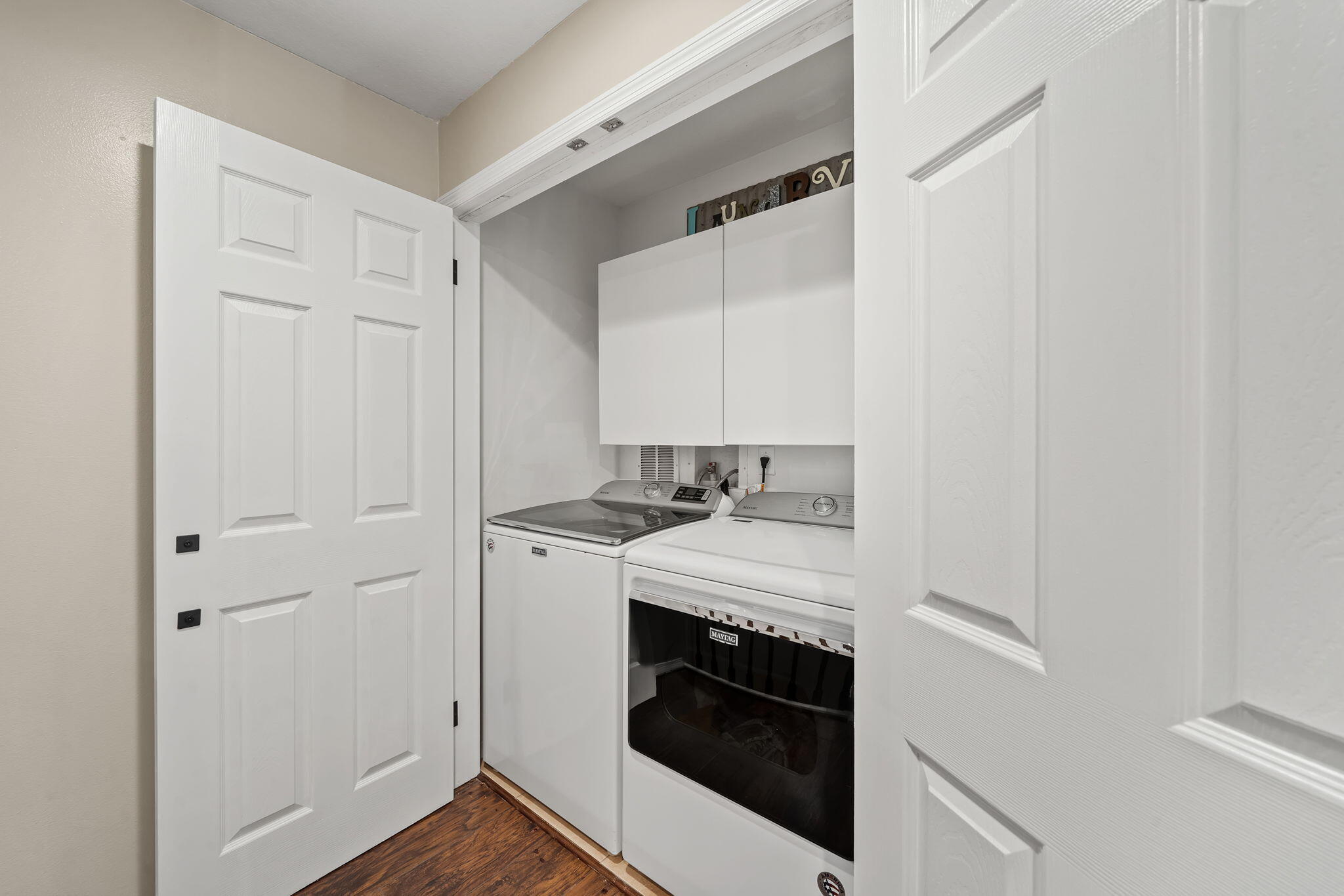123 Wakulla Springs Way Royal Palm Beach, FL 33411 - Photo 22 of 27 a kitchen with a stove and a sink
