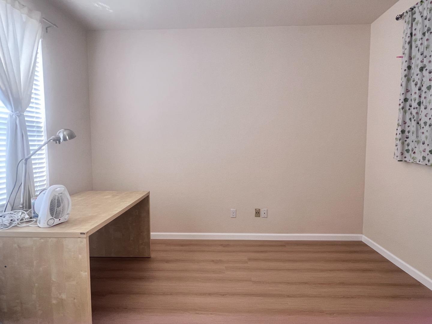 110 Whits Road Mountain View, CA 94040 - Photo 21 of 33 a room with linen closet and wooden floor
