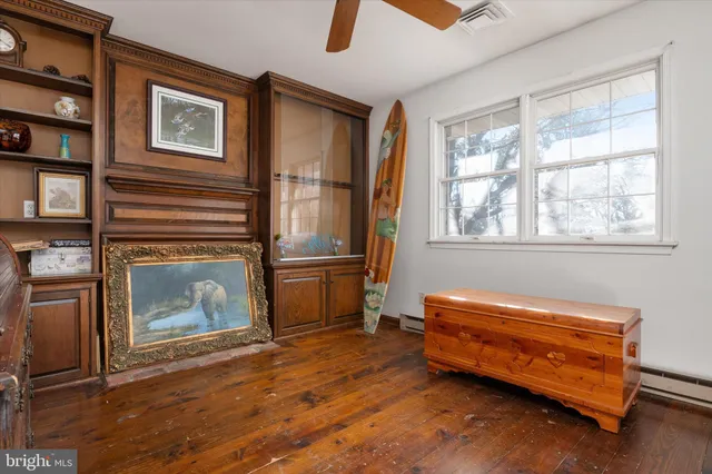 a bedroom with a bunk bed and a dresser