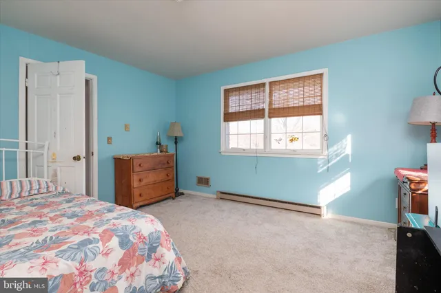 a room with furniture and window