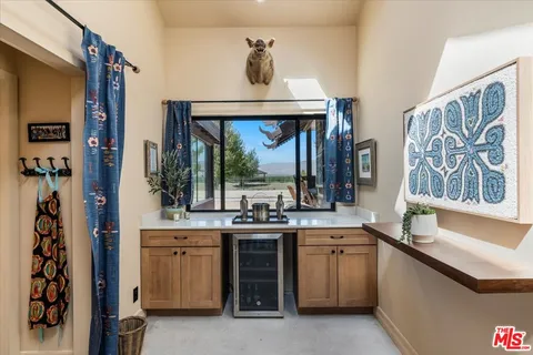 a kitchen with a stove and a sink