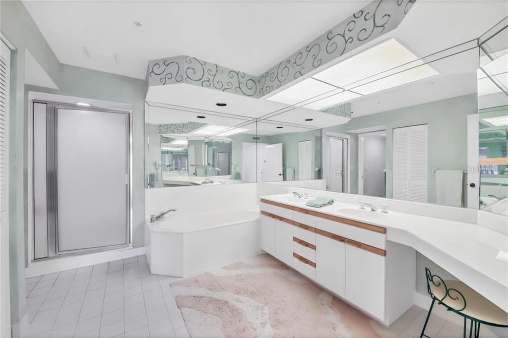 11000 Placida Road, Unit 1003 Placida, FL 33946 - Photo 19 of 41 Master Bath offers a soaking tub, separate shower & dual sinks