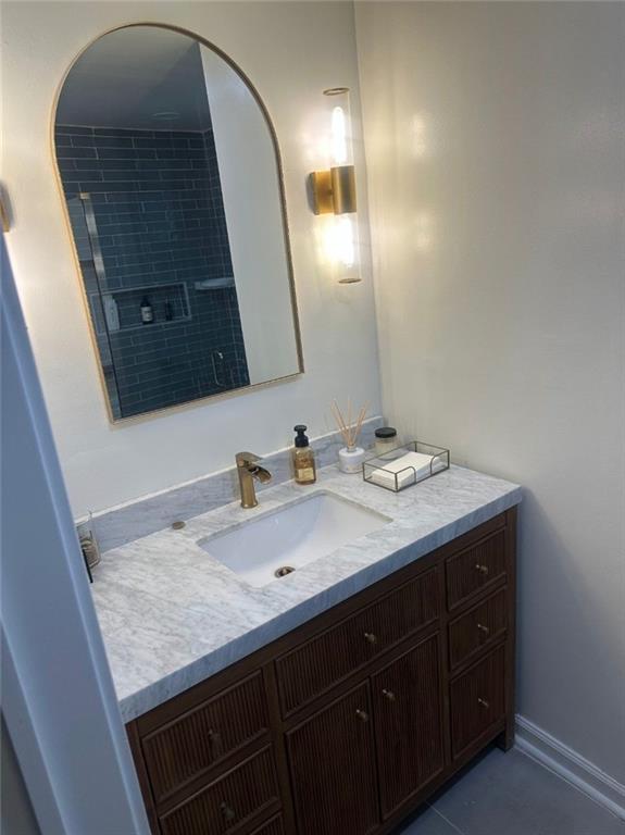 2434 Rockcliff Road Southeast Atlanta, GA 30316 - Photo 23 of 26 a bathroom with a sink and a mirror
