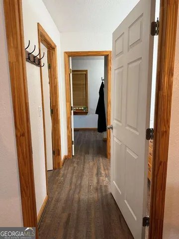 a view of hallway with walk in closet