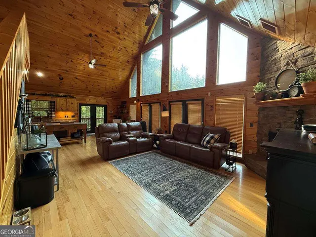 a living room with furniture and a rug