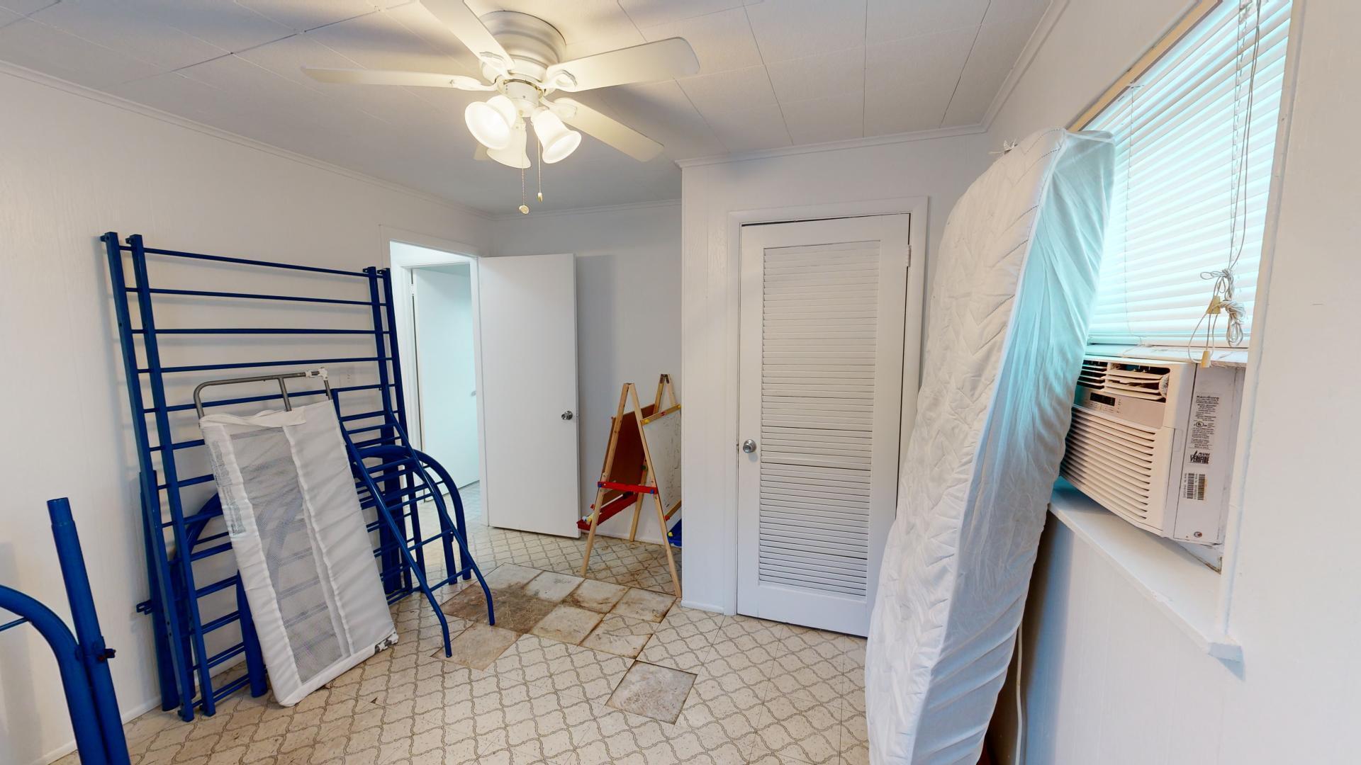 59 Tarpon Avenue Key Largo, FL 33037 - Photo 11 of 24 a view of a hallway with closet
