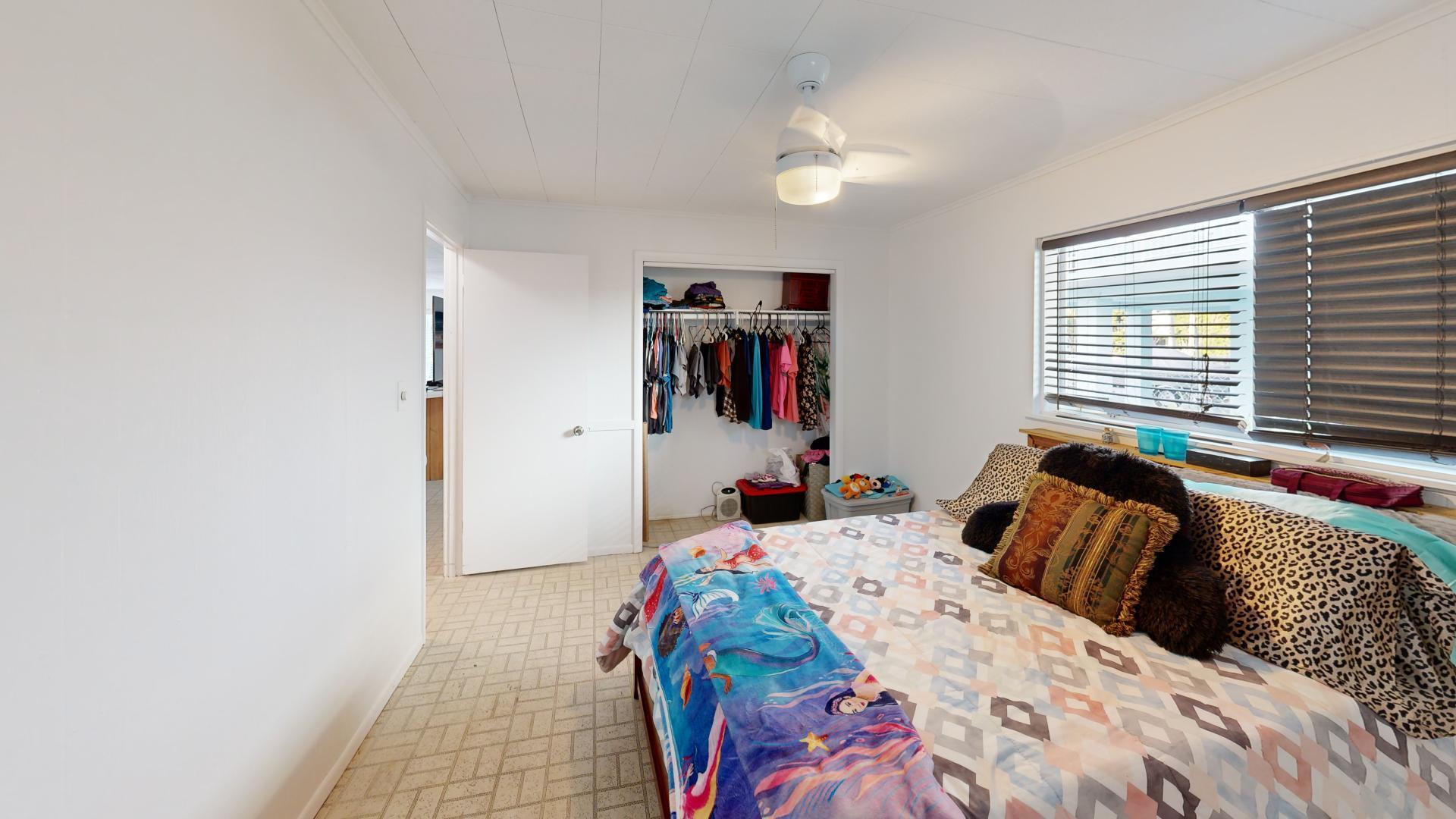 59 Tarpon Avenue Key Largo, FL 33037 - Photo 14 of 24 a bedroom with a bed and a window
