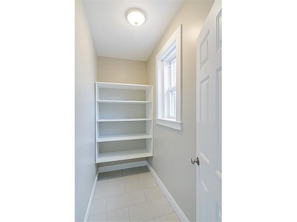 4 Leicester Street, Unit 4 Boston, MA 02135 - Photo 10 of 12 a view of a room with a furniture and a window