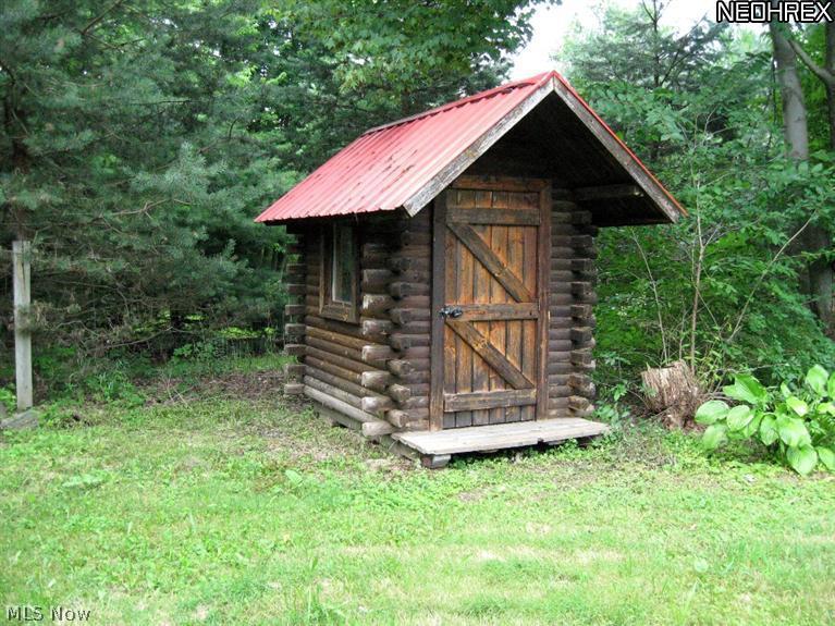 3110 Dutt Road Barberton, OH 44203 - Photo 17 of 21 Log Cabin Playhouse.